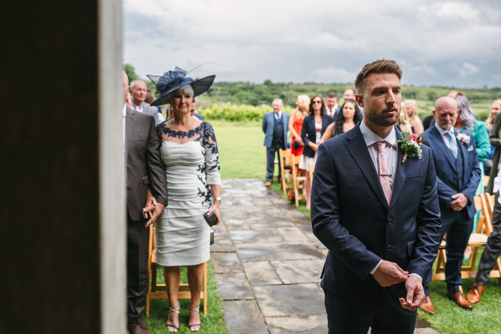Groom awaits bride - documentary wedding photographer Devon and Cornwall