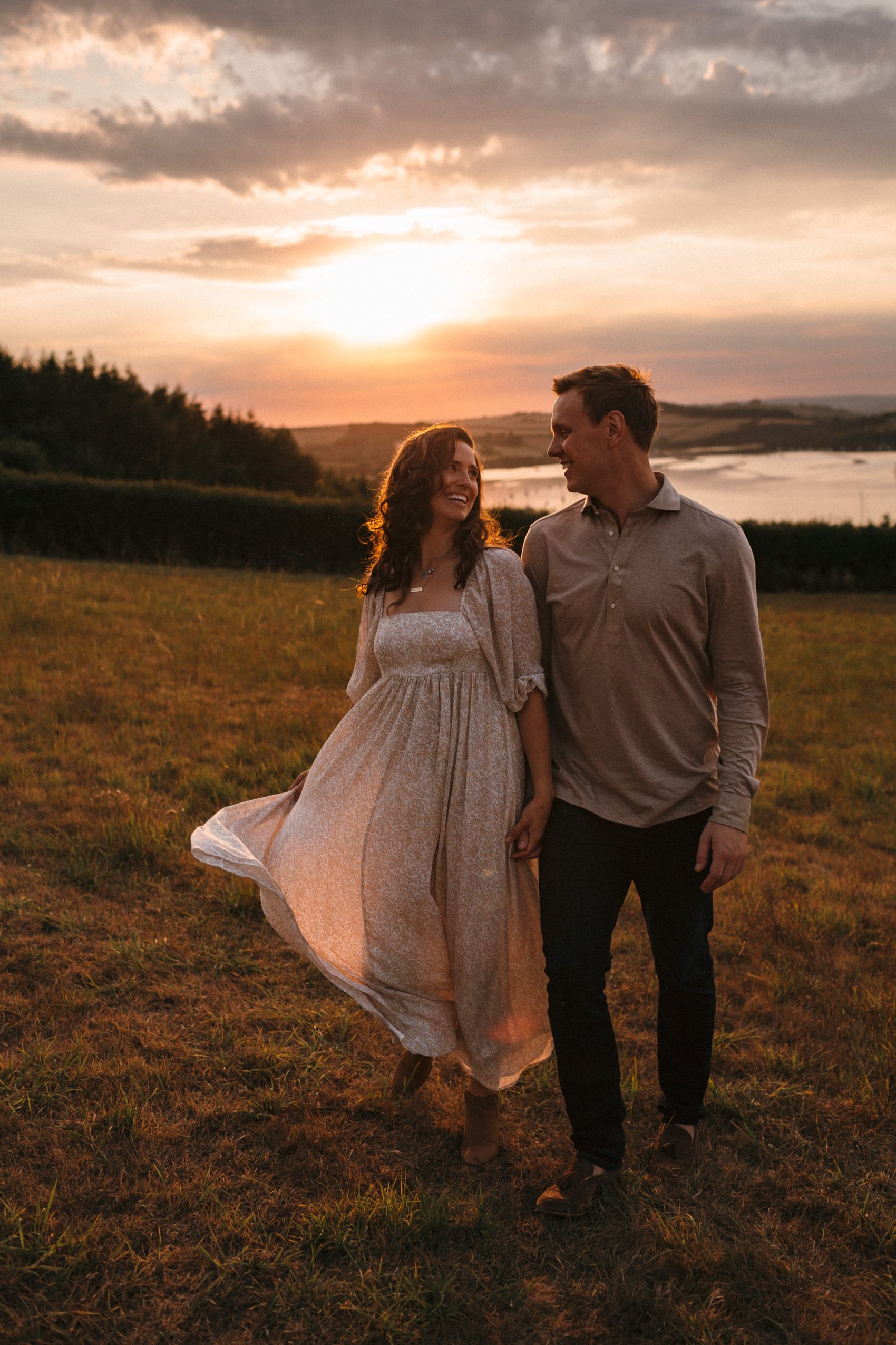 Sunset relaxed engagement shoots in Devon by wedding photographer Freckle Photography