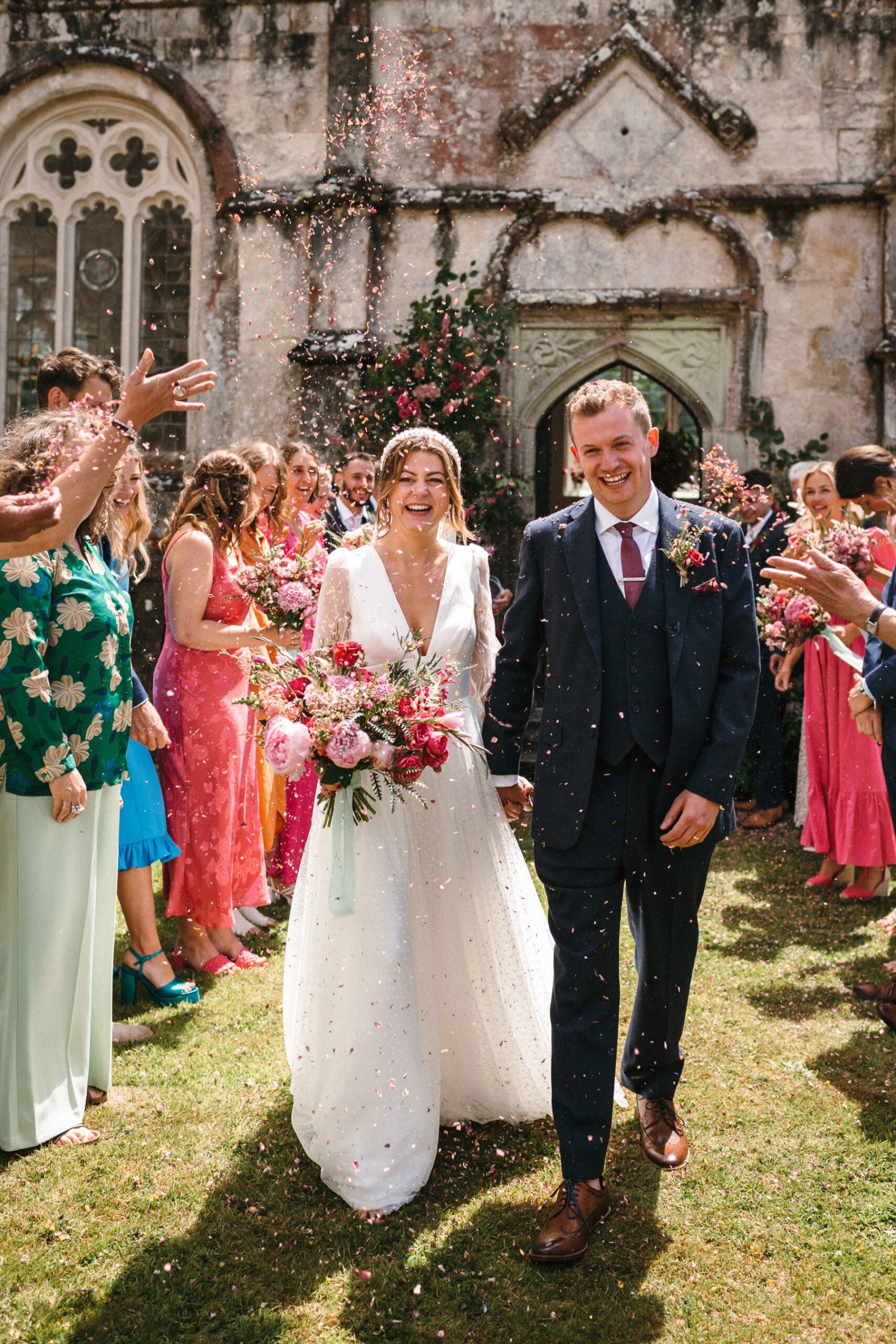 Get the best confetti photos! Captured by Wedding photographer Cornwall Freckle  photography at Trelowarren Estate