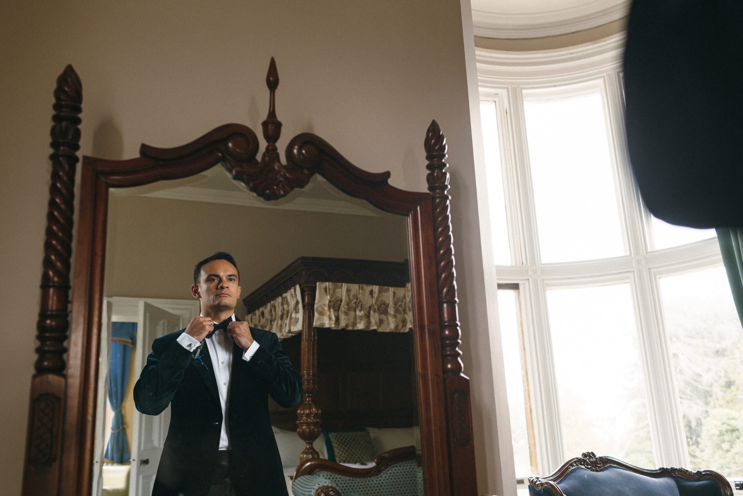 Groom wears velvet jacket at Orchardleigh House Wedding
